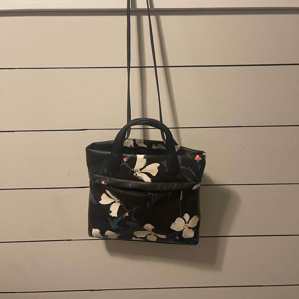 Floral black leather bag with adjustable straps